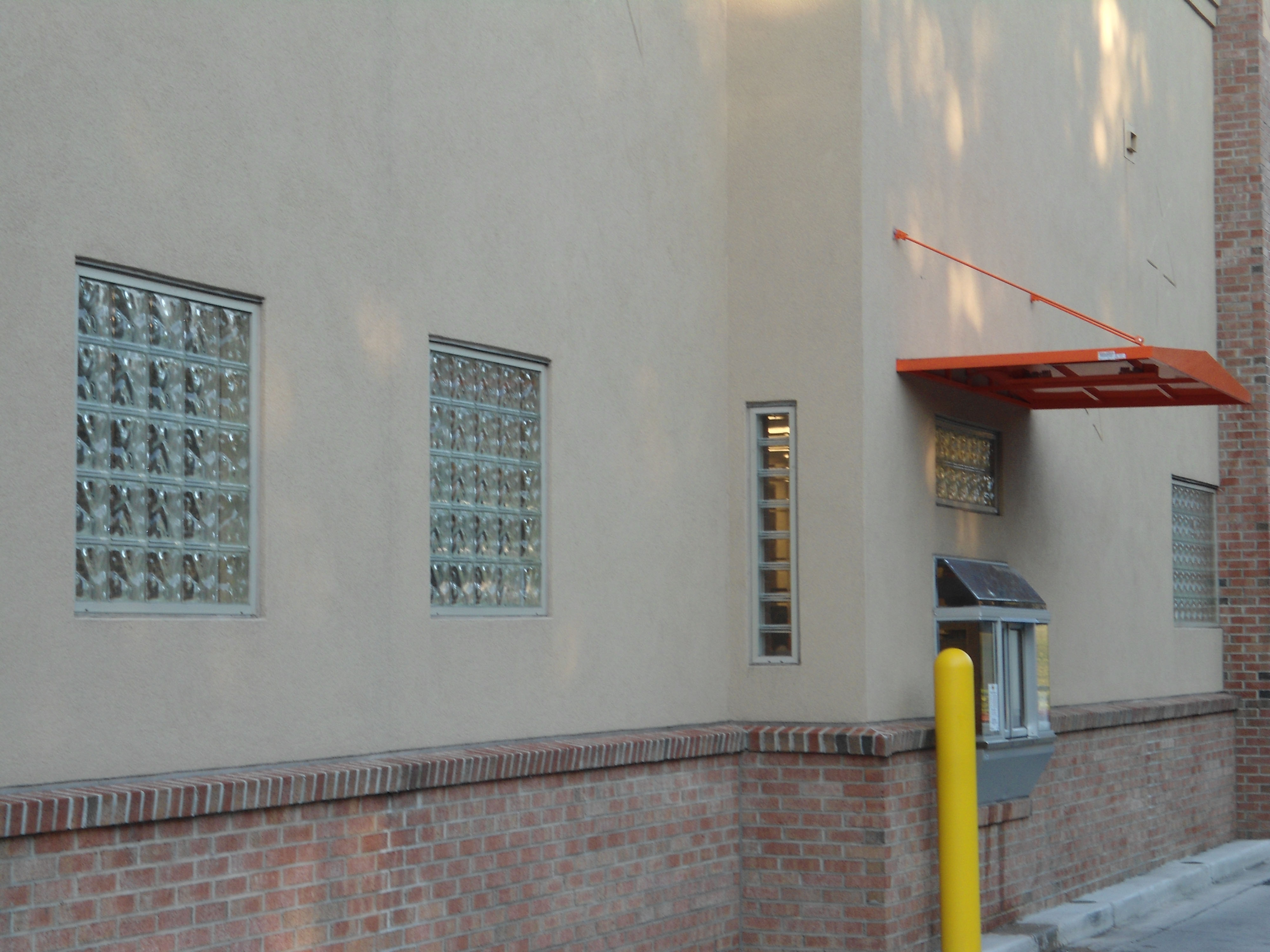 Installing glass sales blocks exterior wall